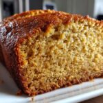 3-Ingredient Magic Banana Bread Recipe You Need Now 8 Warm, moist banana bread with a golden crust and rich aroma
