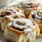 Classic Cinnamon Rolls with Cream Cheese Frosting — Soft spiraled rolls topped with creamy icing.