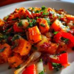 Clean-Eating Sweet Potato Breakfast Hash — Sweet potatoes sautéed with veggies and spices.