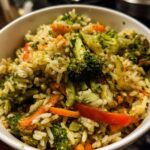 Vegetarian Rice & Veggie Nourish Bowl — Clean-eating bowl with seasoned vegetables.