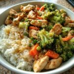 Warm Chicken & Veggie Rice Bowl — Comforting lunch bowl with garlic rice.