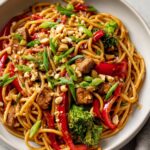 spicy peanut chicken noodle bowl asian comfort meal